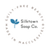 Silktown Natural Soap Co. logo with a blue leaf symbol on a white background