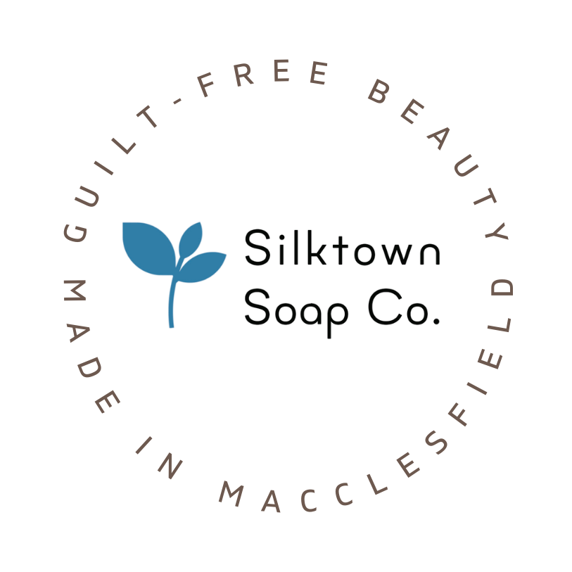 Silktown Natural Soap Co. logo with a blue leaf symbol on a white background