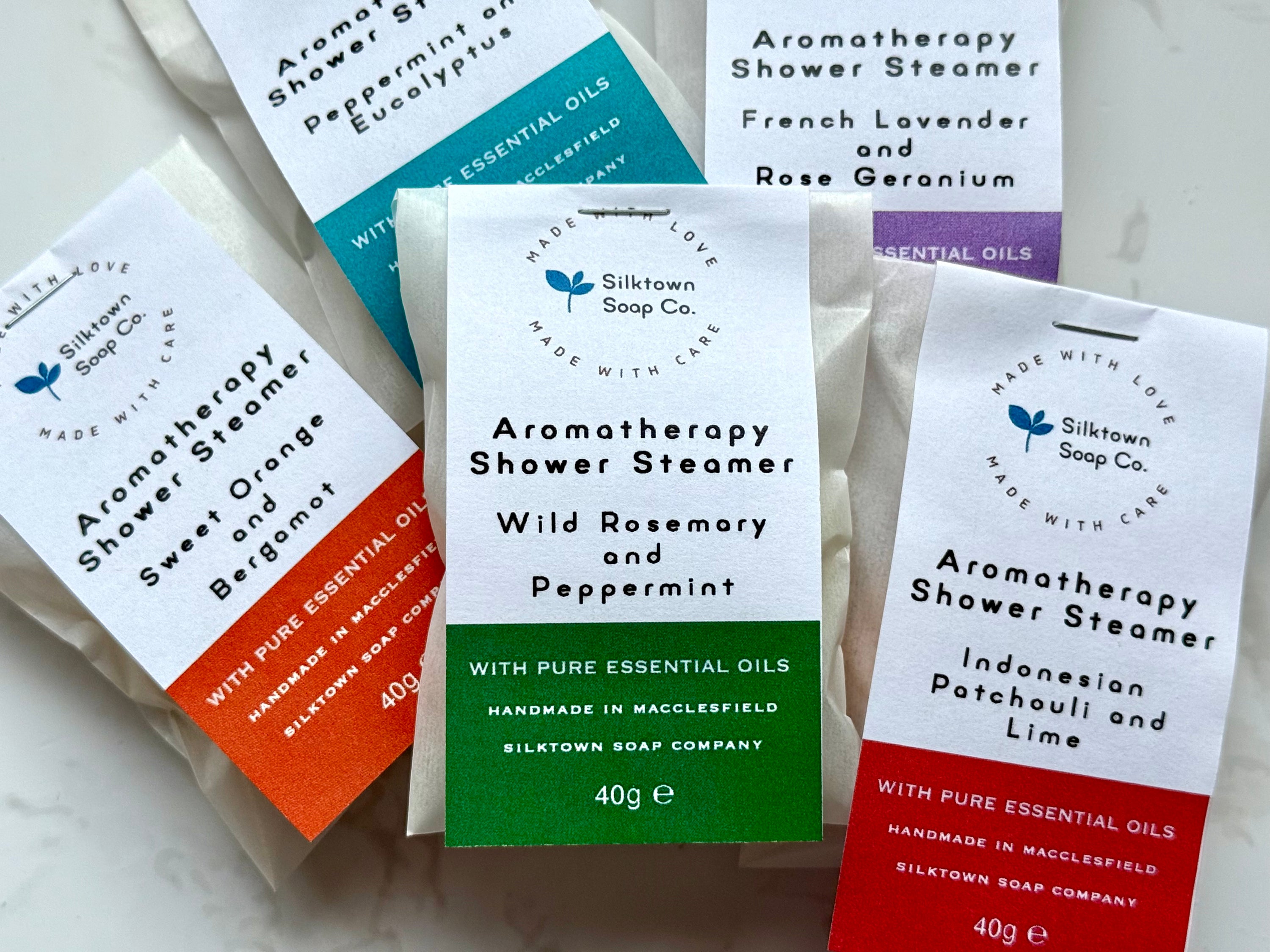 Essential oil shower steamers packaged