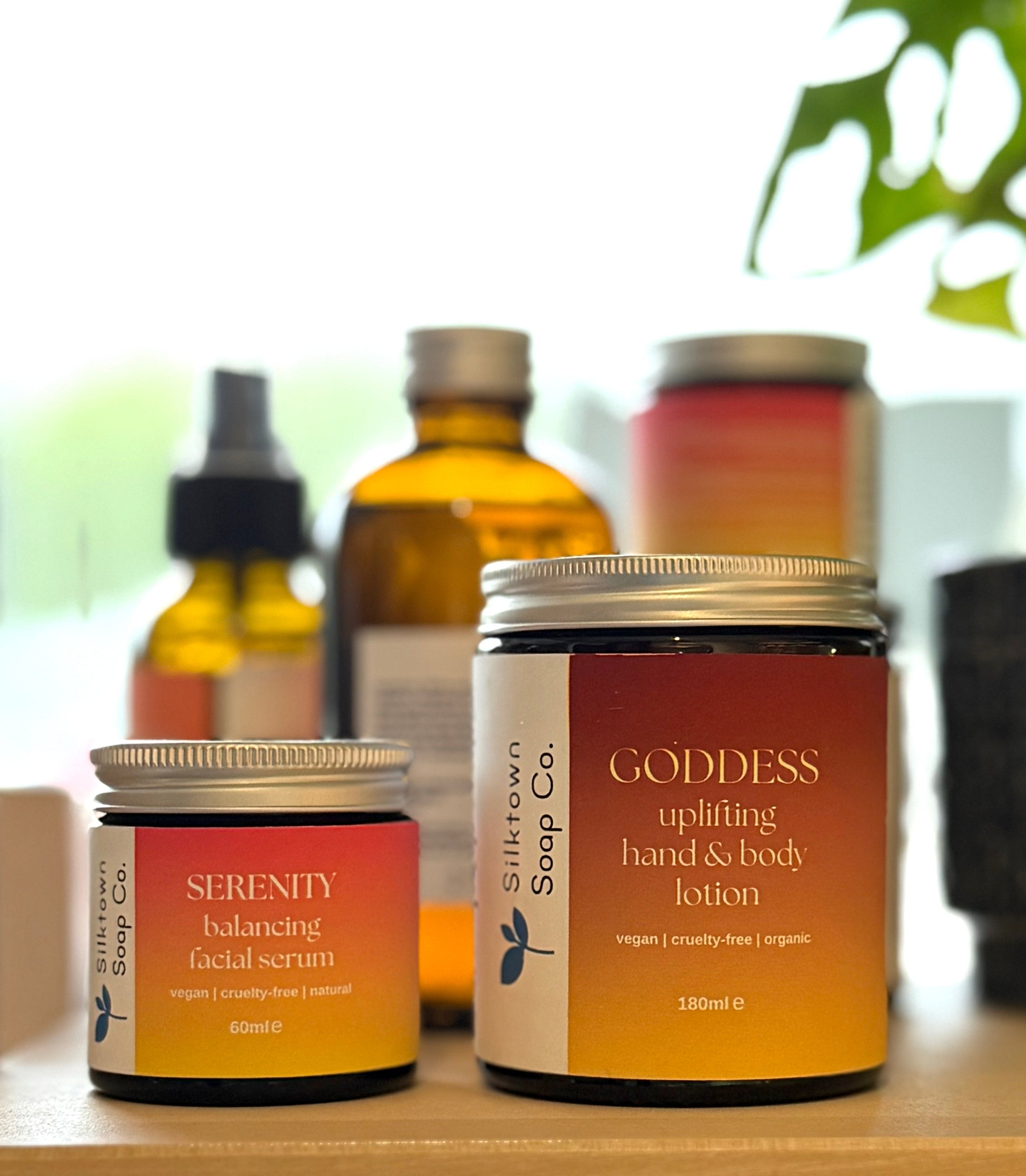A selection of natural skincare products with orange labels