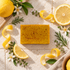 A rectangular bar of yellow soap with &