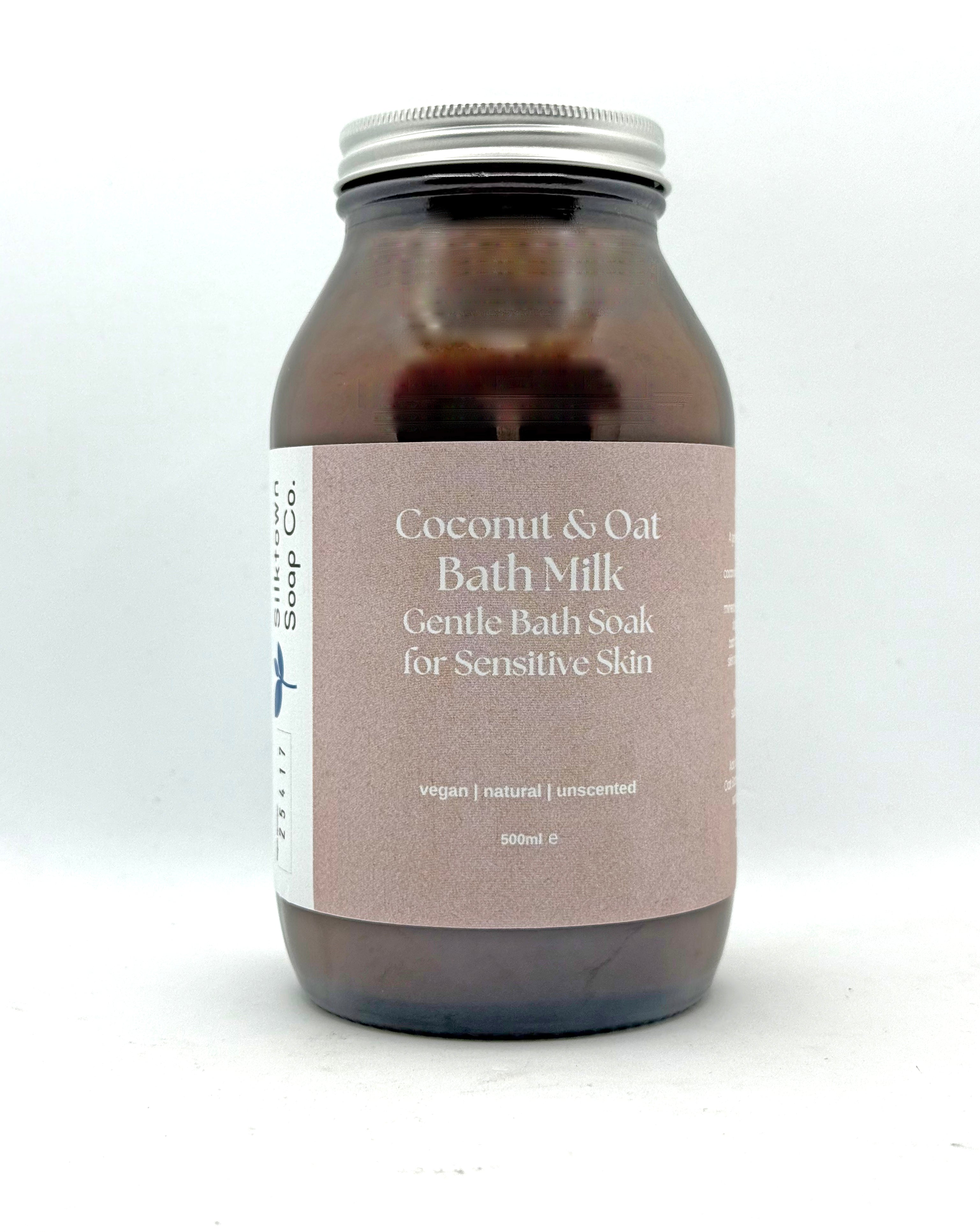 Jar of Coconut &amp; Oat Bath Milk on a white background