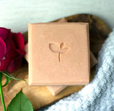 Enchanted natural soap bar with a red rose
