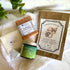 Gardeners gift set with soap, hand cream, and packaging on a white surface.