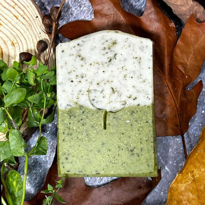 Gardeners Herbal natural Soap bar on stone with leaves and wood