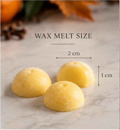 Three small yellow wax melts on a light marble surface with overlaid text reading &