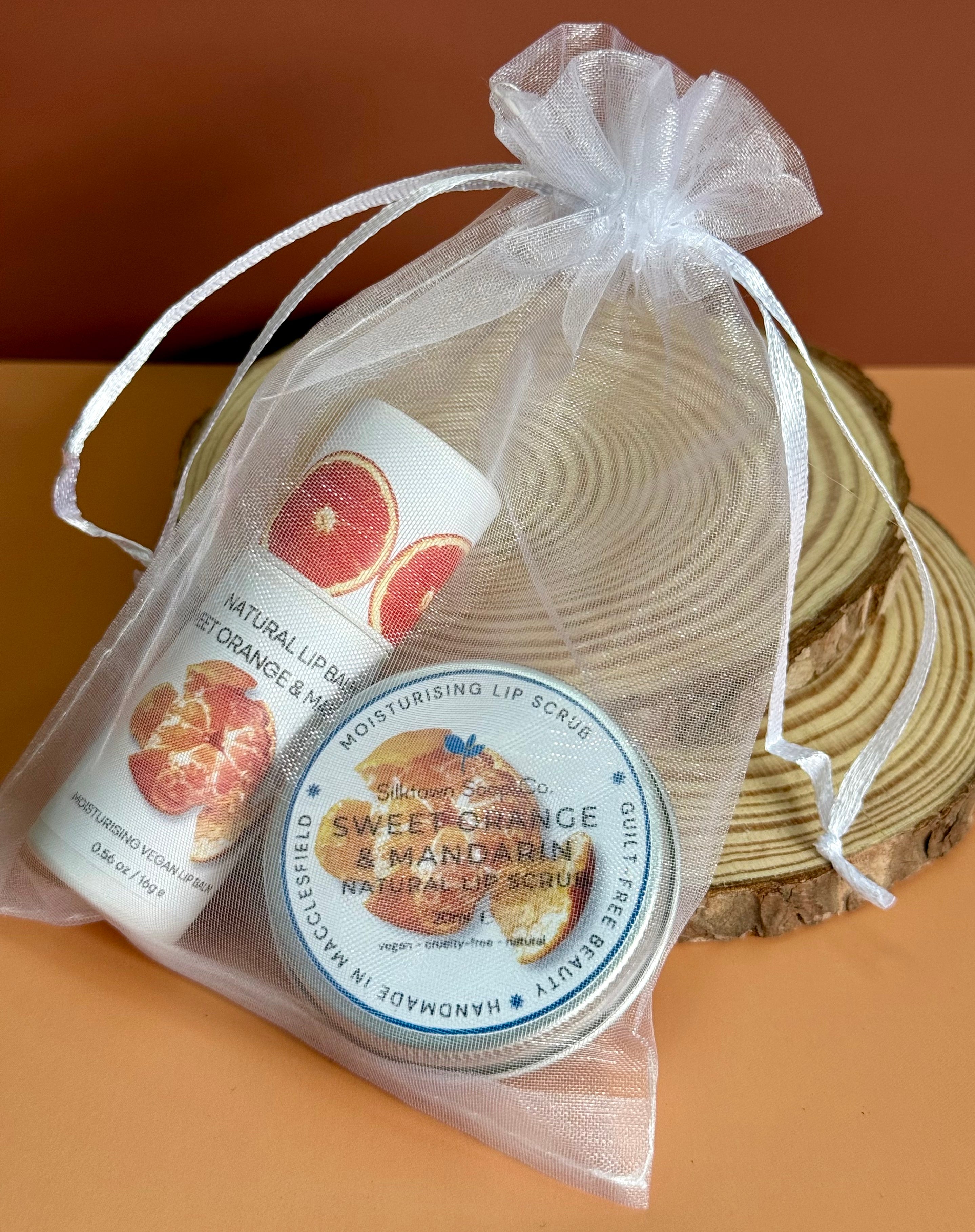 Mandarin and orange natural lip care duo in a bag