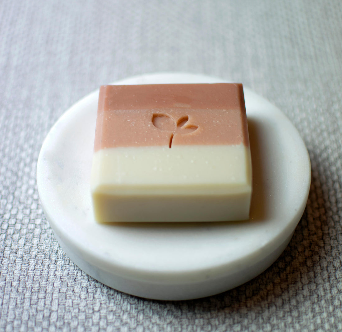 Midsummer Meadow handmade soap bar on a dish