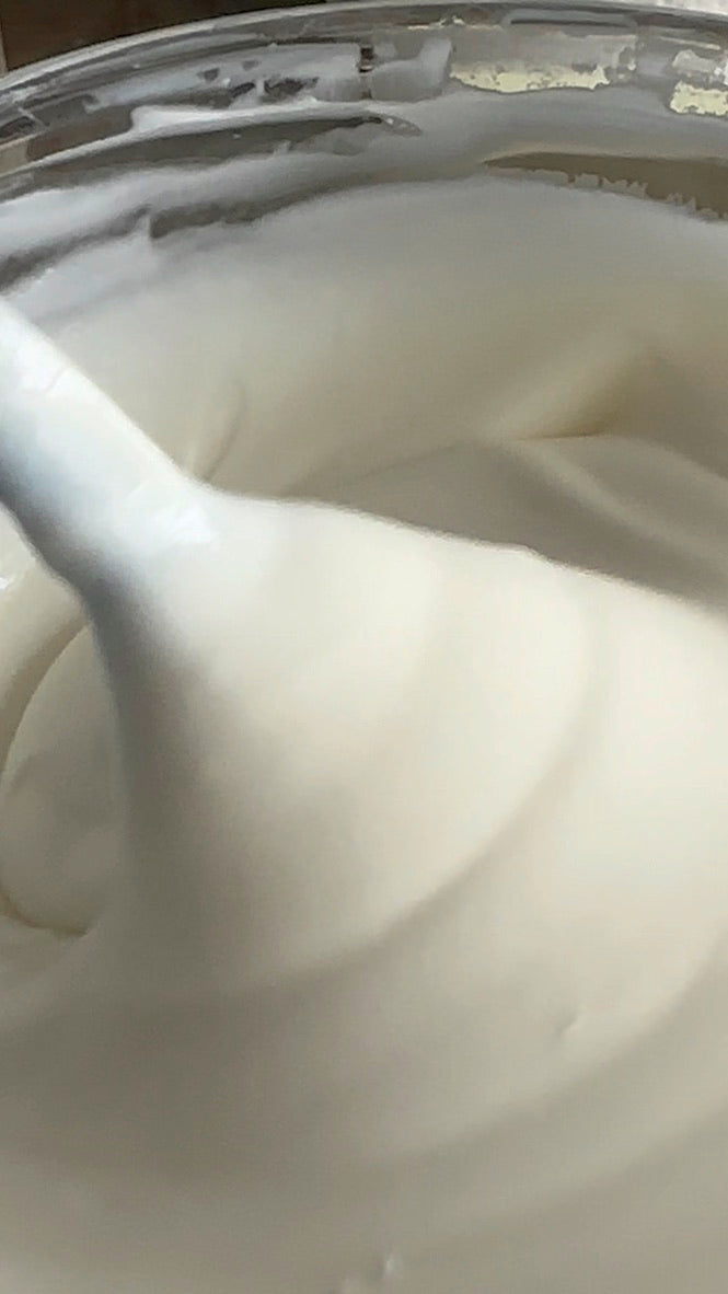 Close-up of natural hand &amp; body Lotion in a container