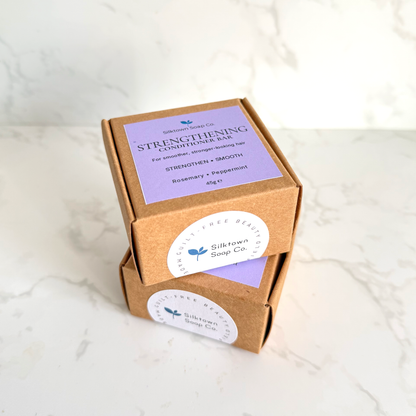 Two stacked brown kraft paper boxes of Silktown Soap Co. &