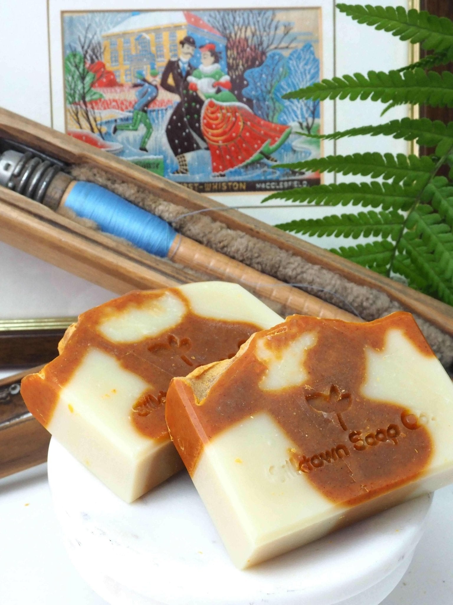 Lotus Silk natural soap bars with silk bobbins a silk picture and foliage