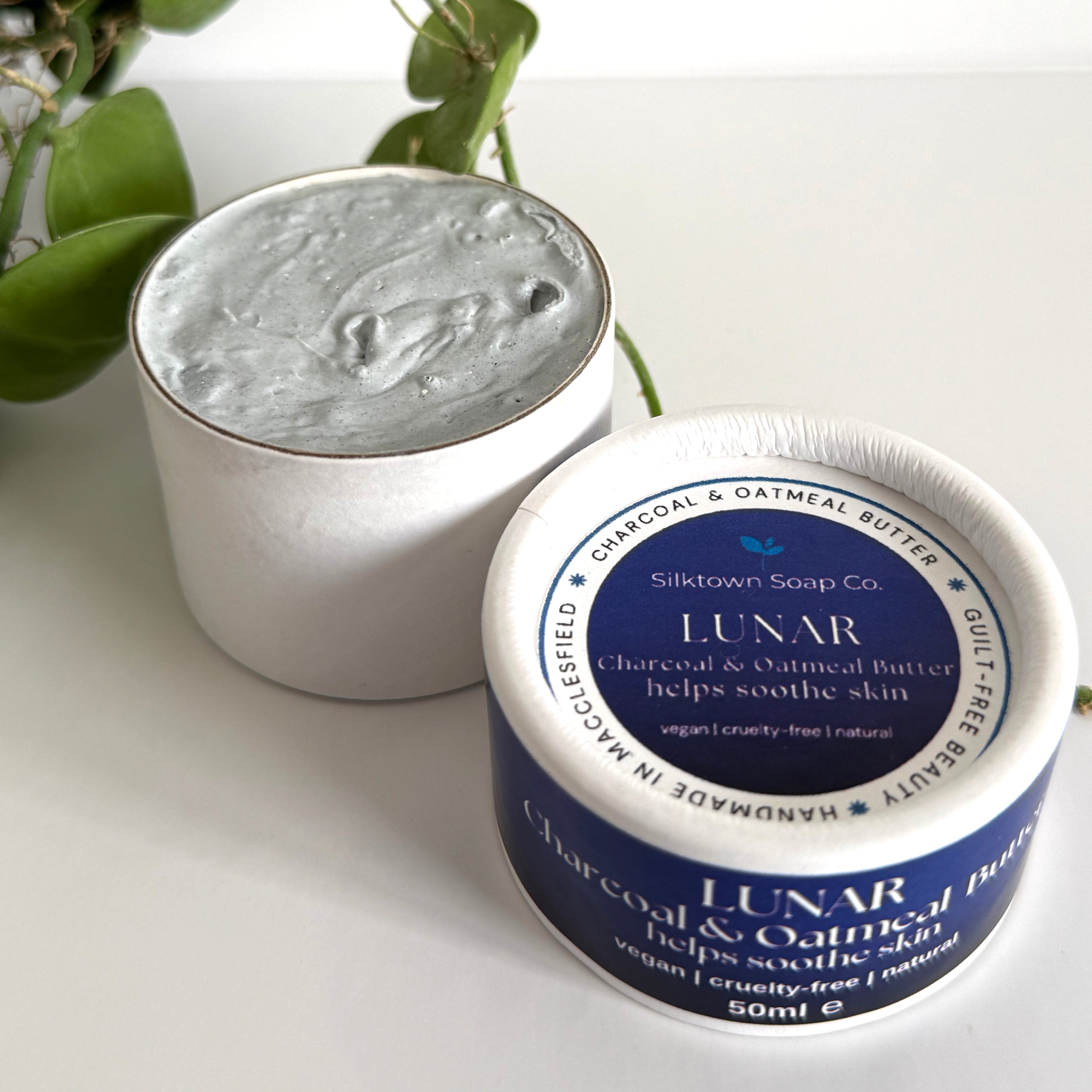 Silktown Soap Co. Lunar charcoal and oatmeal butter product with packaging on a white background