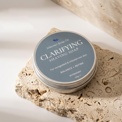 Clarifying shaving soap on stone slab 