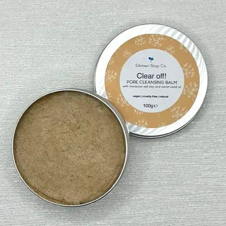 An open tin of vegan friendly Pore cleansing facial balm for oily skin